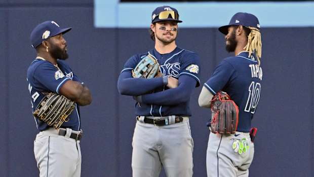 Tampa Bay Ray outfielders Randy Arozarena, Josh Lowe, and Raimel Tapia